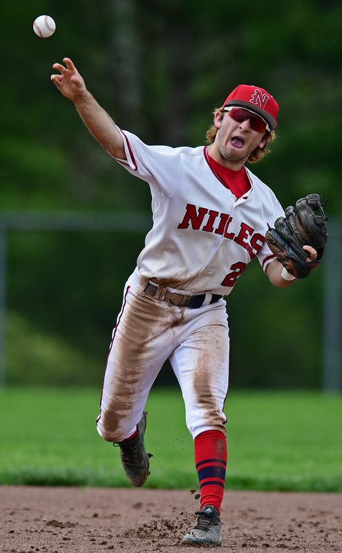 STRUTHERS, OHIO - MAY 15, 2018: Niles' Zach Leonard throws the ball to first for the out in the third inning of their OHSAA tournament game on Tuesday afternoon at Cene Park. Niles won 4-3. DAVID DERMER | THE VINDICATOR
