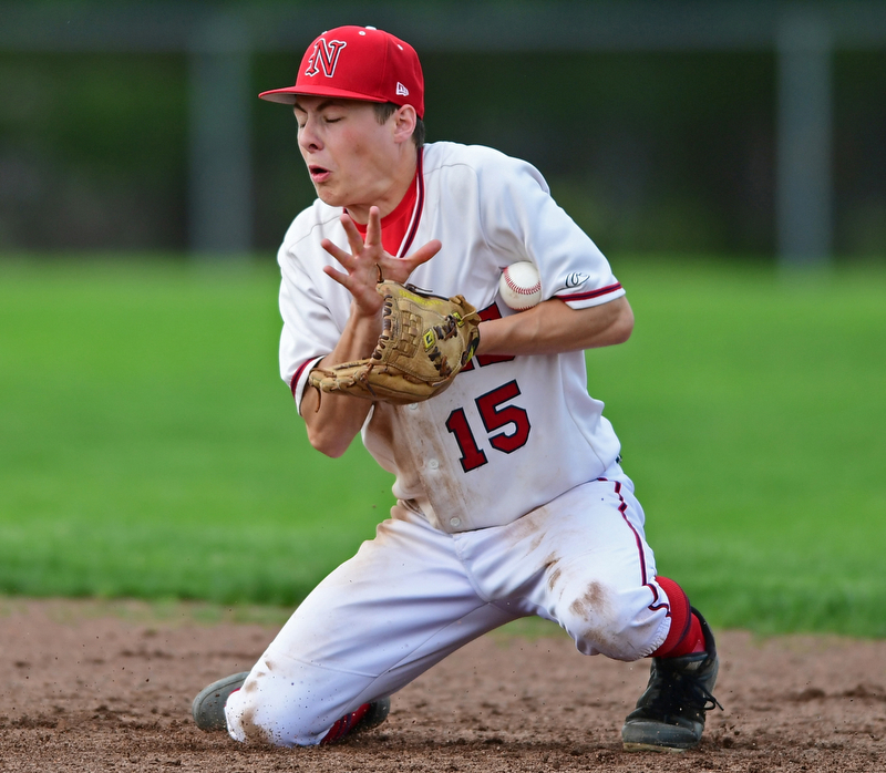 STRUTHERS, OHIO - MAY 15, 2018: Niles' Luke Swauger fields the ball before throwing it to first for the final out in the seventh inning to defeat Poland on Tuesday afternoon at Cene Park. Niles won 4-3. DAVID DERMER | THE VINDICATOR