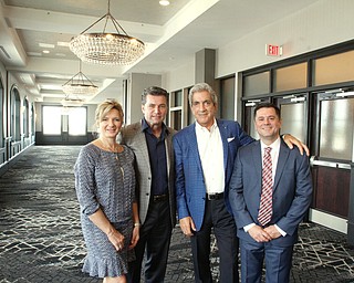 From left, Jackie and Dominic Marchionda, and George Pantelidis and David Rizzuto of Pan Brothers Associates stand in the DoubleTree’s 12th-floor ballroom. Jackie designed the interior; Dominic’s NYO Property Group developed the hotel with Pan Brothers Associates as a partner.