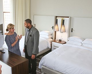    ROBERT K YOSAY  | THE VINDICATOR.. Terrill Vidale and Jackie Marchionda talk about one of the suites....Double Tree in Youngstown opened its restaurant and Hotel today Wed. in the former Stambaugh Building.  The building  has been restored to its original marble and granite and then some....-30-