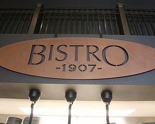    ROBERT K YOSAY  | THE VINDICATOR..The Bistro 1907 restaurant and bar on the ground floor..cylindrical lights over a bar area....Double Tree in Youngstown opened its restaurant and Hotel today Wed. in the former Stambaugh Building.  The building  has been restored to its original marble and granite and then some....-30-