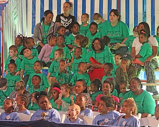    ROBERT K YOSAY  | THE VINDICATOR.. Students from Youngstown City Schools preschool program enjoy the show..The Zoppe Family Circus is returning to the Canfield Fairgrounds May 16-20 for 12 shows..Founded in 1842, the Zoppe Family Circus is a one-ring circus under the big top featuring acrobats, equestrian showmanship, canine tricks, clowns and plenty of audience participation. ...-30-