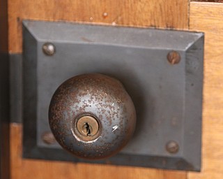    ROBERT K YOSAY  | THE VINDICATOR..one of the original door knobs .Double Tree in Youngstown opened its restaurant and Hotel today Wed. in the former Stambaugh Building.  The building  has been restored to its original marble and granite and then some....-30-