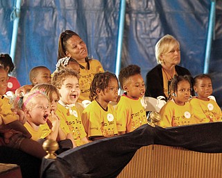    ROBERT K YOSAY  | THE VINDICATOR.. Students from Youngstown City Schools preschool program enjoy the show..The Zoppe Family Circus is returning to the Canfield Fairgrounds May 16-20 for 12 shows..Founded in 1842, the Zoppe Family Circus is a one-ring circus under the big top featuring acrobats, equestrian showmanship, canine tricks, clowns and plenty of audience participation. ...-30-