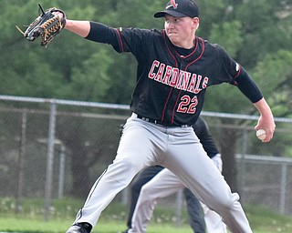 William D. Lewis The Vindincator Canfield'sIan McGraw(22) delivers during win over Niles 5-17-18.