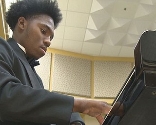 Darrius Simmons, a 17-year-old Warren junior at Warren G. Harding High School has captured attention across the country with his ability as a classical pianist, appeared on NBC Nightly News with Lester Holt on May 15.  A crew from NBC filmed it at Harding High on Monday.