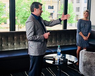 Developer Dominic Marchionda and wife Jacqueline speak to the media during today's tour of the DoubleTree by Hilton on East Federal Street.