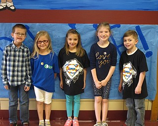Neighbors | Zack Shively.The students particpated in a penny wars program to raise money for autism awareness. The coin war had the classrooms compete against each other to raise the most money. The winning classroom got a pizza party. Pictured are, from left, students Nicolas Bugno, Isabella Slick, Charlie Arnaut, Katherine Rudiak and Joshua Miller.