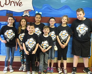 Neighbors | Zack Shively.Stadium Drive Elementary received money from the coin wars and shirt sales during the Light It Up Blue program. The funds went toward the Autism Society of the Mahoning Valley and the school's special education classrooms and curriculum. Pictured in their Light It Up Blue shirts are, from left, (front) Alex Martinez and Joshua Miller; (back) Jordyn Miller, Carley Albanese, Natalie Ludban, Lily Vondran, Addie Rudge and Braydon Rudge.