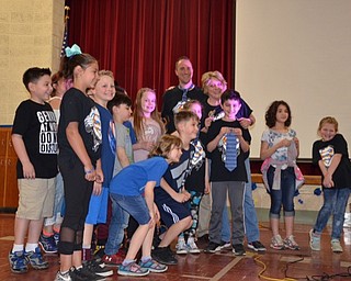 Neighbors | Submitted.Stadium Drive Elementary ended their Light It Up Blue week with an assembly about autism awareness and acceptance on April 13. During the assembly, students used some of the special education equipment, such as thermabands, and the students from one class cut a blue tie off Principal Michael Zoccali.