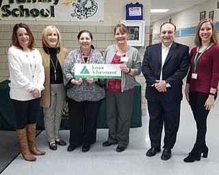 Neighbors | Submitted.Junior Achievement volunteers recently came to work with Holy Family students. Pictured are, from left, Kristine Rotunno, Holy Family Principal Kathleen Stoops, Tracie Balentine, Kimberly Urig, Tony Patrone and Nicole Fond.