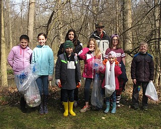 Neighbors | Zack Shively.Many of the organizations who helped Mill Creek in the Earth Day Clean Up were scouting organizations. They learned the principal of "Leave no trace" through the program. Pictured, Girl Scout Service Unit 821 from Boardman and Poland returned from cleaning up a trail on Lake Newport East.