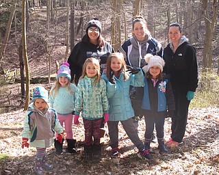 Neighbors | Zack Shively.The Earth Day Clean Up allowed for  groups to help clean the areas of Mill Creek MetroParks that park crews cannot always reach. Pictured, Austintown's Girl Scout Troop 80207 picked up trash from behind the Ford Nature Center.