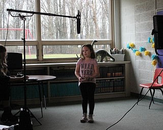 Neighbors | Abby Slanker.A C.H. Campbell Elementary School first-grade student is interviewed for a national art project titled “If I Were the President” on April 16.