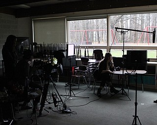 Neighbors | Abby Slanker.A C.H. Campbell Elementary School first-grade student answered questions from Anna Sergeeva and Aimee Hoffman as they filmed him for Sergeeva’s film project “If I Were the President” on April 16.