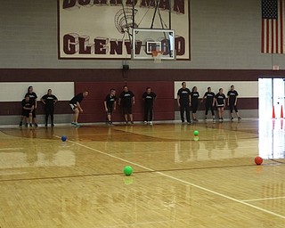 Neighbors | Zack Shively.Each team in the junior high school's dodgeball tournament had to have 12 players with five boys, five girls and two more of either gender. Pictured, the team of teachers prepared to take on the eighth-grade team.