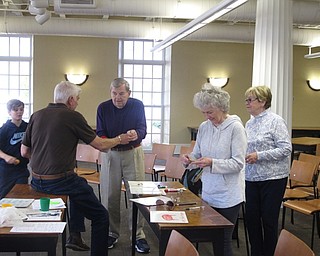 Neighbors | Zack Shively.Ron Saffell organized a couple activities for the group to do. Both activities taught the attendees to identify different object in French. One of the activities had the group split into pairs and have polite, brief conversations in French.