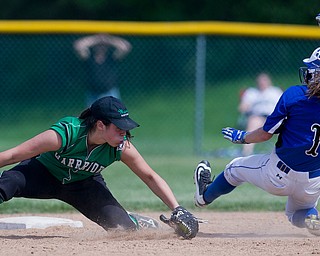 ALLIANCE, OHIO - MAY 17, 2018, Softball Poland Bulldogs vs West Branch Warriors: West Branch's Delaney Rito (22) tags out Poland's Brooke Bobbey(1) attempting to steal 2nd base during the 5th inning at Alliance High School.  MICHAEL G. TAYLOR | THE VINDICATOR