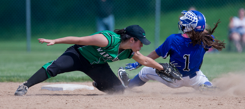 ALLIANCE, OHIO - MAY 17, 2018, Softball Poland Bulldogs vs West Branch Warriors: West Branch's Delaney Rito (22) tags out Poland's Brooke Bobbey(1) attempting to steal 2nd base during the 5th inning at Alliance High School.  MICHAEL G. TAYLOR | THE VINDICATOR