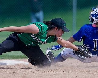 ALLIANCE, OHIO - MAY 17, 2018, Softball Poland Bulldogs vs West Branch Warriors: West Branch's Delaney Rito (22) tags out Poland's Brooke Bobbey(1) attempting to steal 2nd base during the 5th inning at Alliance High School.  MICHAEL G. TAYLOR | THE VINDICATOR