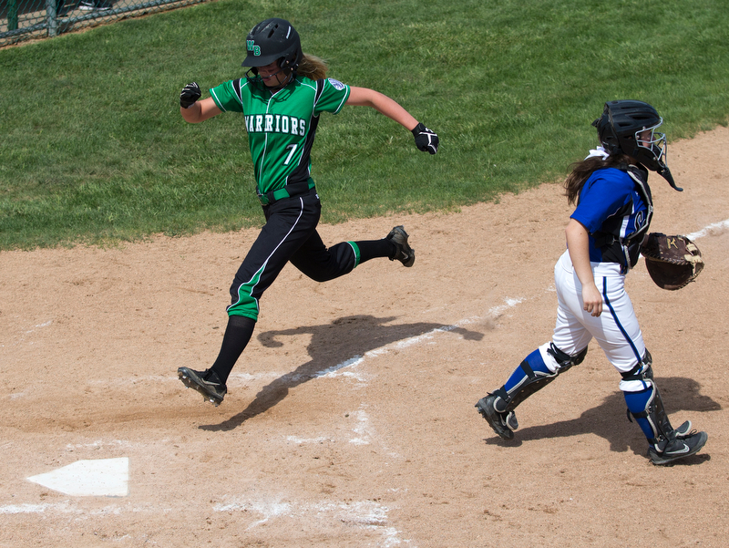 ALLIANCE, OHIO - MAY 17, 2018, Softball Poland Bulldogs vs West Branch Warriors: West Branch's Grace Heath  (7) scores during the 3rd inning at Alliance High School.  MICHAEL G. TAYLOR | THE VINDICATOR