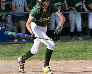 ALLIANCE, OHIO - MAY 17, 2018, Ursuline Irish vs Mooney Cardinals: Ursuline's Maris Barbato (10) bunts for a hit knocking in a run during the 3rd inning at Alliance High School.  MICHAEL G. TAYLOR | THE VINDICATOR