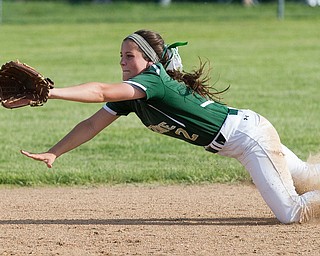 ALLIANCE, OHIO - MAY 17, 2018, Ursuline Irish vs Mooney Cardinals: Ursuline's Macy Ross (2) makes a diving attempt to field the ball during the 4th inning at Alliance High School.  MICHAEL G. TAYLOR | THE VINDICATOR