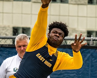 DIANNA OATRIDGE | THE VINDICATOR Youngstown East's Terrence Yeboah releases the shot put during the Division I District Track Meet at Austintown Fitch on Friday..