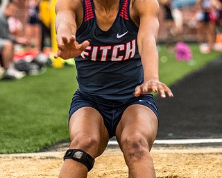 DIANNA OATRIDGE | THE VINDICATOR Austintown Fitch's Khala Cameron lands her second place long jump at the Division I District Track Meet at Austintown Fitch on Friday, qualifying her to the Regional semi-finals..