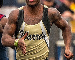DIANNA OATRIDGE | THE VINDICATOR Warren G. Harding's Kayron Adams sprints to the finish line in first place to win the Boys 100 M Dash in the Division I District Track and Field Championship in Austintown on Friday, qualifying for the Regional semi-finals.
