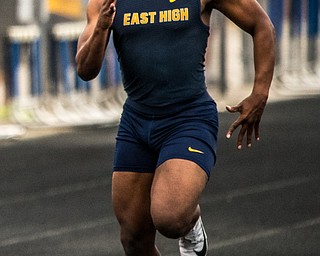 DIANNA OATRIDGE | THE VINDICATOR Youngstown East's Giovanni Washington finished third in the Boys 100 Meter Dash at the Division I District Track and Field Championship in Austintown on Friday, qualifying for the Regional semi-finals..