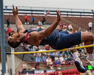 DIANNA OATRIDGE | THE VINDICATOR Austintown's Jakari Lumsden attempts his high jump at 6 feet 4 inches and goes on to win the event at the Division I District Track and Field Championship at Austintown Fitch on Friday, qualifying for the Regional semi-final.