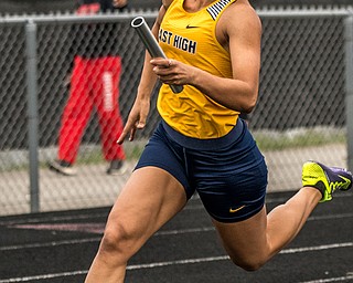 DIANNA OATRIDGE | THE VINDICATOR Youngstown East's Kyndra Matlock runs her leg of the Girls 4 x 200 Meter Relay at the Division I District Track and Field Championship at Austintown Fitch on Friday..