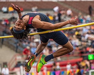 DIANNA OATRIDGE | THE VINDICATOR Austintown Fitch's Deondre McKeever clears the bar and finishes second in the Boys High Jump at the Division I District Track and Field Championship in Austintown on Friday, advancing to the upcoming Regional semi-finals.
