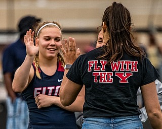 DIANNA OATRIDGE | THE VINDICATOR Austintown Fitch's Madison Skelly gets a high five from her supporters after finishing fourth in a jump-off at the Division I District Track and Field Championship in Austintown on Friday, qualifying her for the upcoming Regional semi-finals.ÊÊ