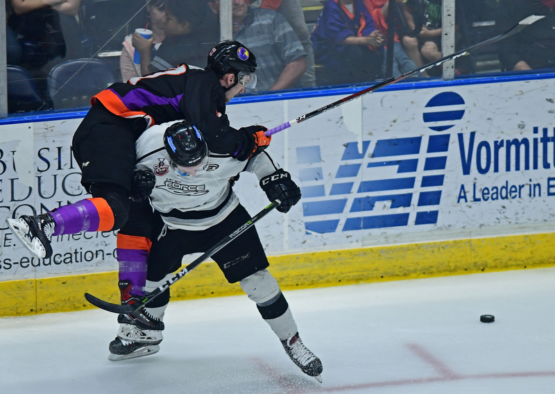 YOUNGSTOWN, OHIO - MAY18, 2018: Phantoms' Joey Abate is checked by Ty Farmer during Friday nights Clark Club Final game at the Covelli Centre. DAVID DERMER | THE VINDICATOR