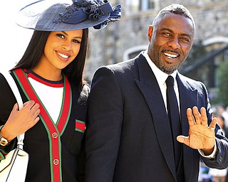 Idris Elba and Sabrina Dhowre arrive for the wedding ceremony of Prince Harry and Meghan Markle at St. George's Chapel in Windsor Castle in Windsor, near London, England, Saturday, May 19, 2018. (Gareth Fuller/pool photo via AP)