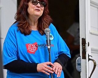 YOUNGSTOWN, OHIO - MAY 19, 2018: Hope Anne Youngstown the Mahoning County Coordinator for Ohio Can speaks at the microphone, Saturday afternoon. DAVID DERMER | THE VINDICATOR