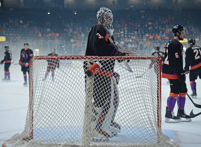 YOUNGSTOWN, OHIO - MAY 19, 2018: Youngstown goalie Ivan Prosvetov stands while Phantoms players skate around behind him during a delay for fog that built up on the ice during the first period of game 4 of the Clark Cup Final, Saturday night at Covelli Centre. DAVID DERMER | THE VINDICATOR