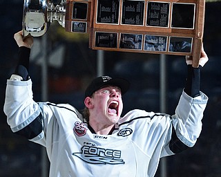 YOUNGSTOWN, OHIO - MAY 19, 2018: Fargo's Jacob Schmidt-Svejstrup celebrates with the Clark Cup after Fargo defeated Youngstown 4-2 to fin the USHL championship, Saturday night in Youngstown. DAVID DERMER | THE VINDICATOR