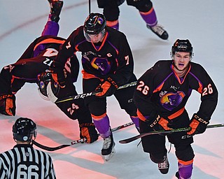 YOUNGSTOWN, OHIO - MAY 19, 2018: Youngtsown's Matthew Barry, right, celebrates with Eric Esposito and Steve Holtz after scoring a goal during the second period of game 4 of the Clark Cup Final, Saturday night at Covelli Centre. DAVID DERMER | THE VINDICATOR