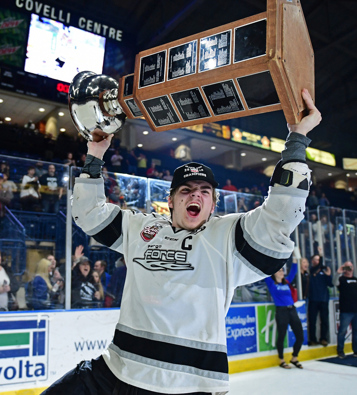 YOUNGSTOWN, OHIO - MAY 19, 2018: Fargo's Mark Senden celebrates with the Clark Cup after Fargo defeated Youngstown 4-2 to fin the USHL championship, Saturday night in Youngstown. DAVID DERMER | THE VINDICATOR