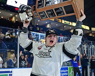 YOUNGSTOWN, OHIO - MAY 19, 2018: Fargo's Mark Senden celebrates with the Clark Cup after Fargo defeated Youngstown 4-2 to fin the USHL championship, Saturday night in Youngstown. DAVID DERMER | THE VINDICATOR