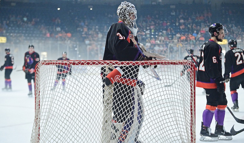 Youngstown goalie Ivan Prosvetov watches his teammates skate to disperse the fog that blanketed the Covelli Centre ice on Saturday. The Phantoms’ USHL Clark Cup Final game against the Fargo Force was delayed three times in the first period because of dangerous conditions.