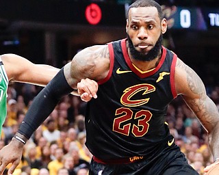 LeBron James scored 44 points, surpassed Kareem Abdul-Jabbar atop a postseason list and helped the Cleveland Cavaliers even the Eastern Conference finals at 2-2 on Monday night with a 111-102 victory over the Boston Celtics.