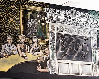 ROBERT K YOSAY  | THE VINDICATOR..This chalk mural, hand-drawn by local artist Christian Powers, depicts the restaurant name and bistro patrons of that era.