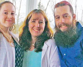 Johnathon George, right, with his sister Kora and his mother Michelle. Johnathon was treated at the trauma unit at St. Elizabeth Youngstown Hospital.