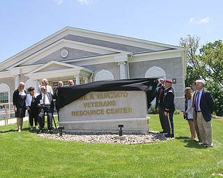 ROBERT K YOSAY  | THE VINDICATOR.....dedication ceremony Wednesday in which the Youngstown State University Office of Veterans Affairs, 633 Wick Ave., was renamed the Carl A. Nunziato Veterans Resource Center....-30-