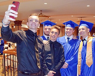 William D. Lewis The Vindicator   Hubbard grads take a selfie prior to commencement 5-23-18 at Stambaugh Auditorium. From left they are : Max Korenyl-Roth, Pothios Pizanias, Mikey VanSuch , Dominic Hover and John O'Hara