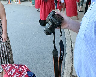 William D Lewis The Vindicator   Niles graduate Kaylie Lewis sports a message of "The Best Is Yet To Come" on her mortar board while her dad Chris Lewis  snaps a photo prior to 5-23-18 commencement at Packard Music Hall in Warren.